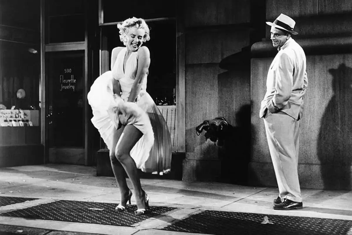 Marilyn Monroe wearing iconic high heels on movie set