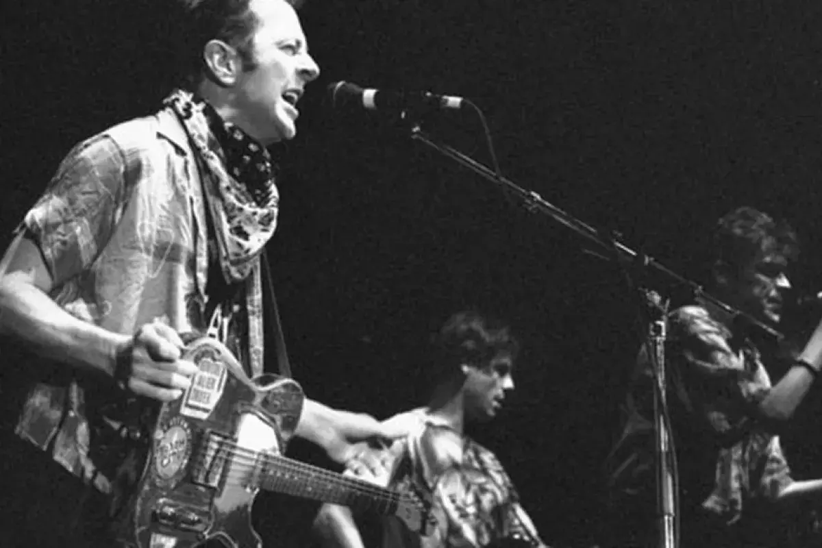 Joe Strummer performing with intensity and presence