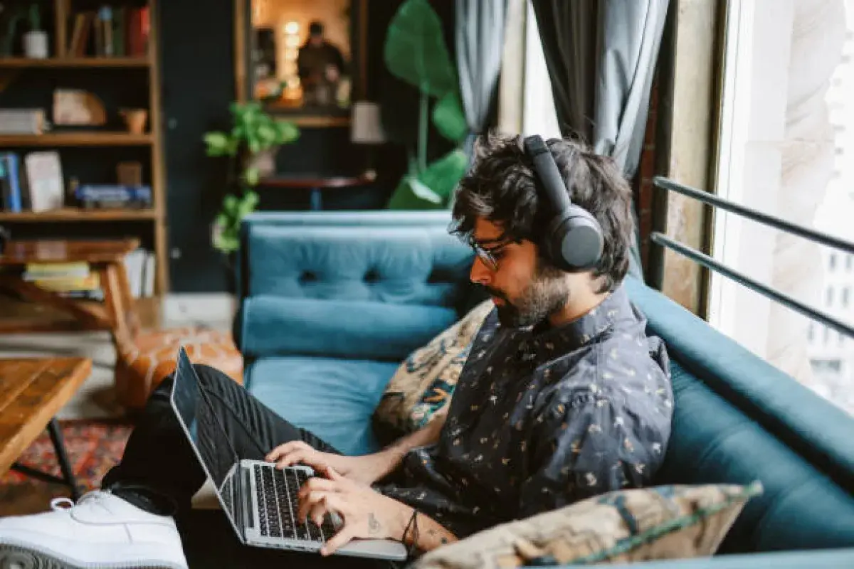 Young remote worker using flexible workspace in 2025