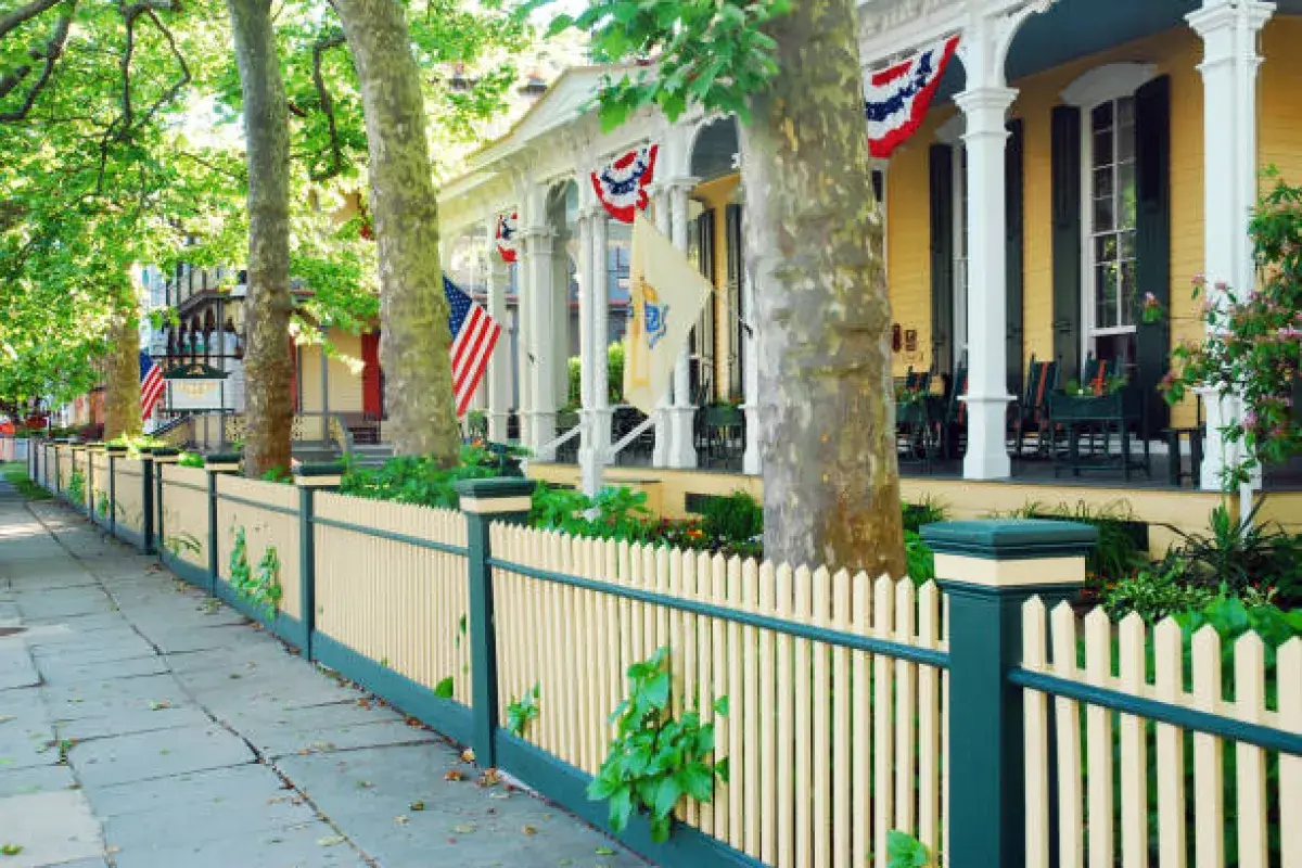 Suburban street featuring traditional wooden American houses