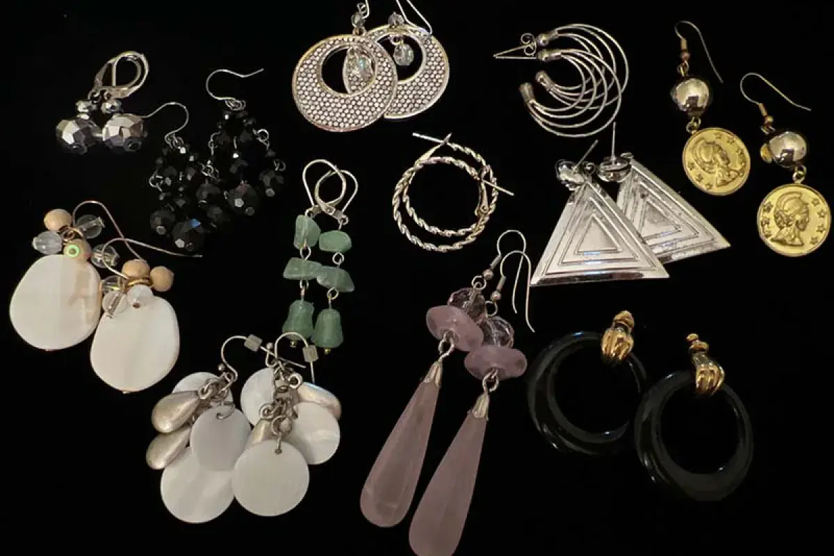 Collection of earrings representing styles from different cultures