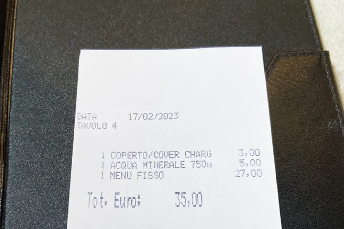 European restaurant bill with included service charge
