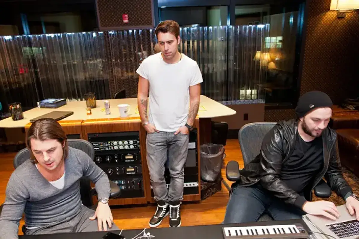 Swedish House Mafia creating progressive house music in studio