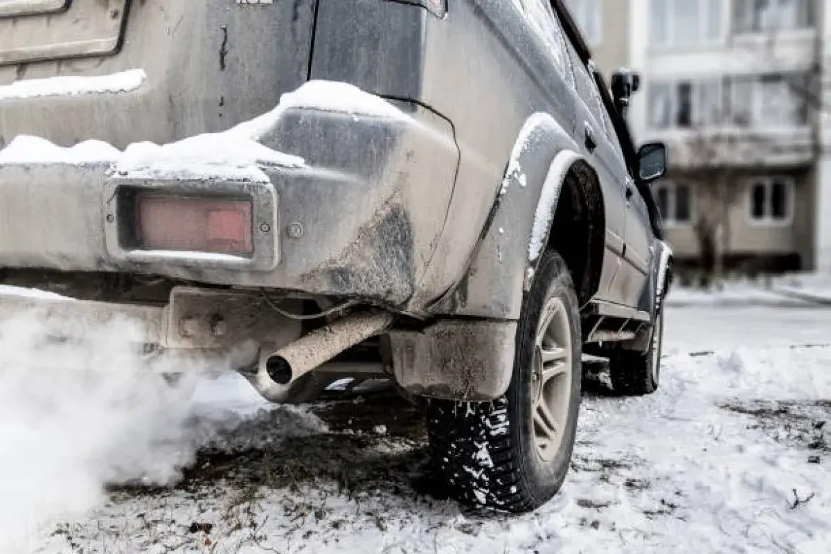 Modern car engine warming up in cold weather