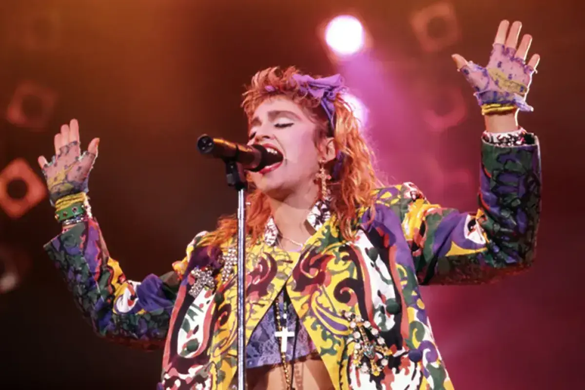 Madonna on stage in 1980s iconic look