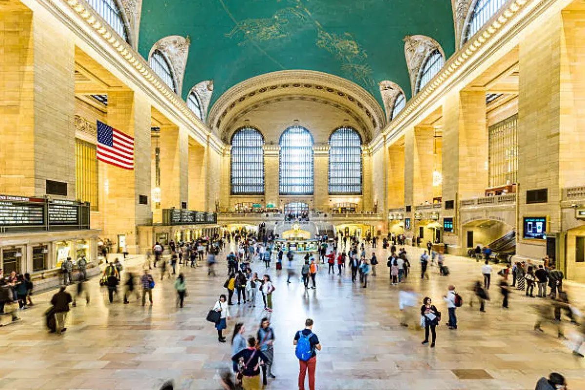 People walking through the main concourse of Grand Central Terminal