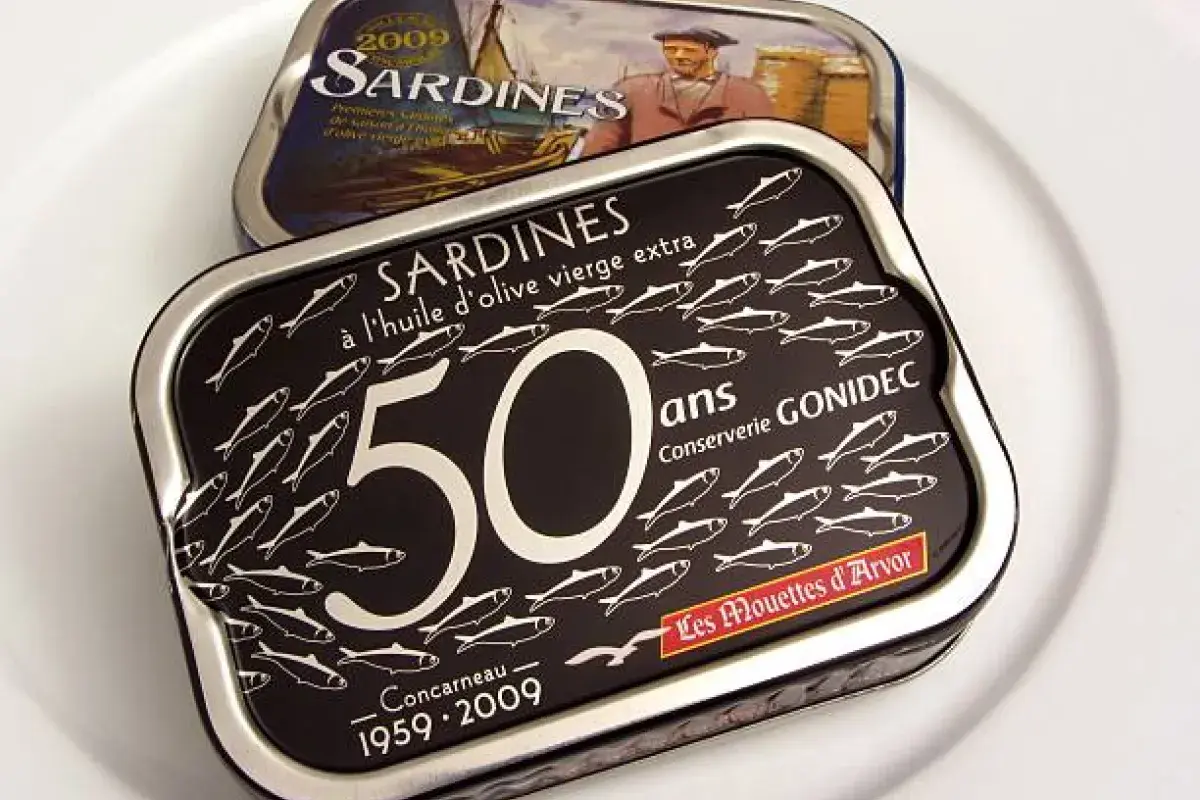 Early twentieth century sardine tins with decorative labels