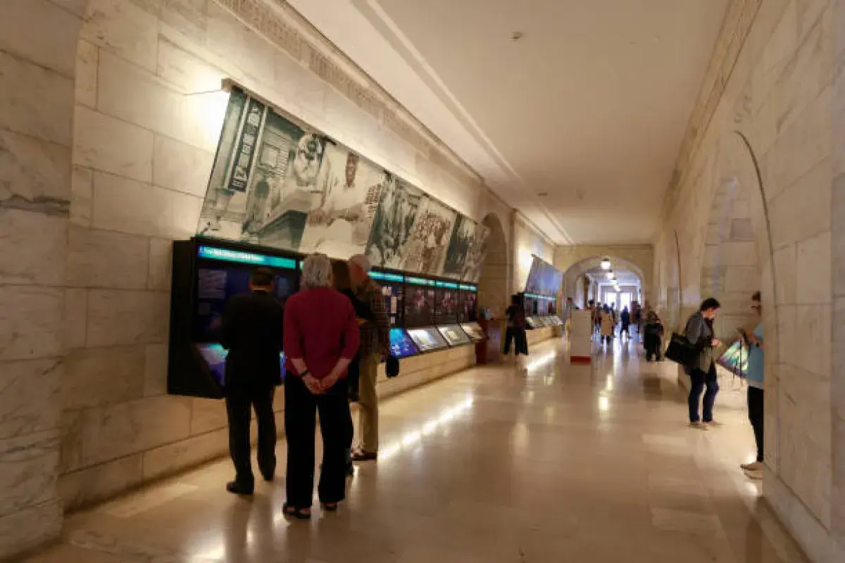 Visitors exploring artwork in a New York City museum