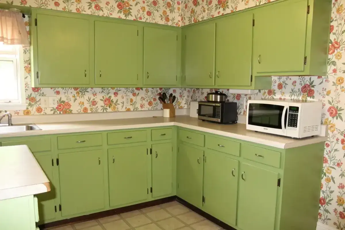1970s kitchen with microwave on the counter