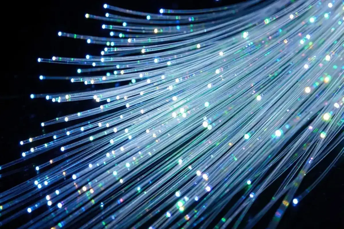 Fiber optic glass strands transmitting light signals for internet data