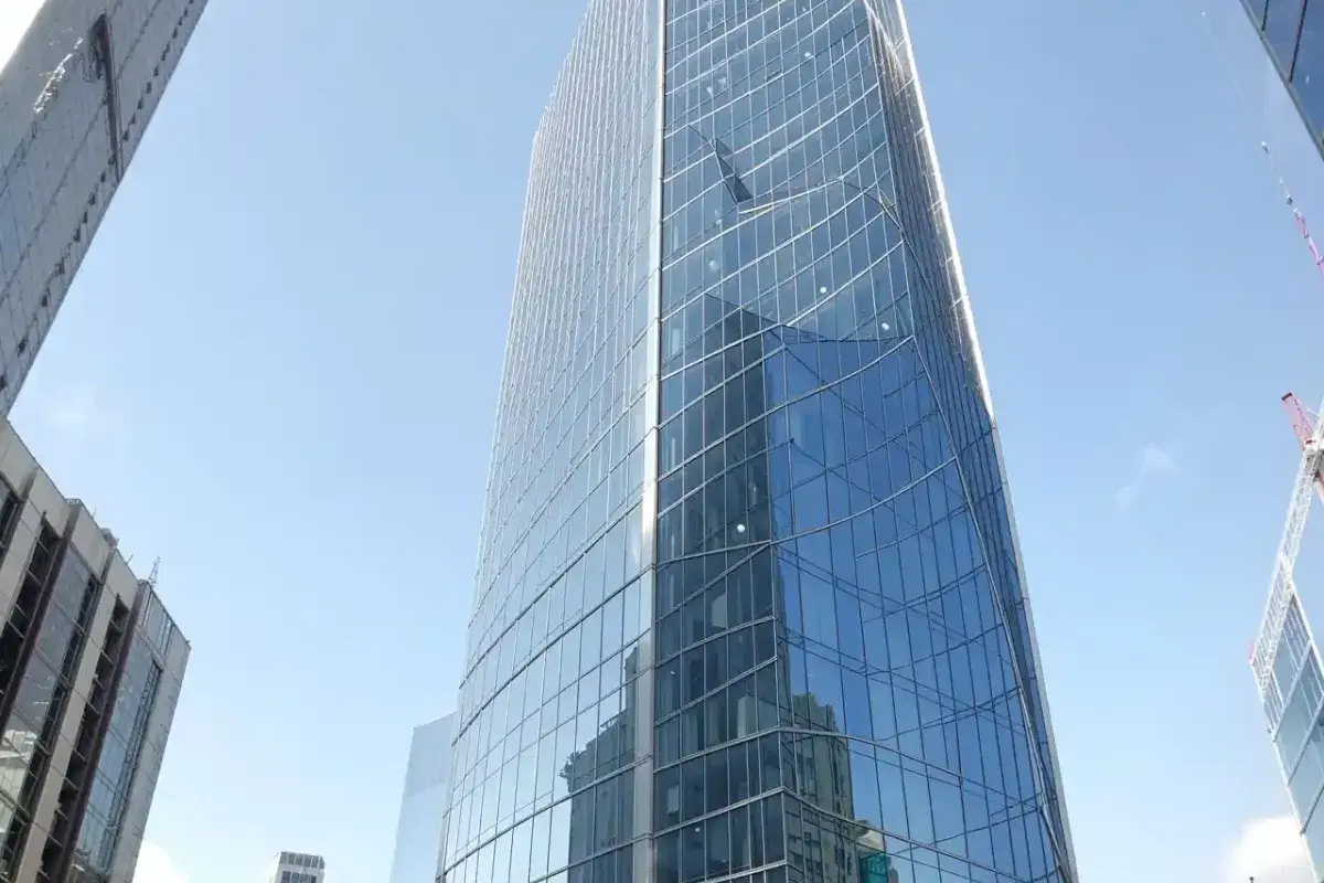 Skyscraper covered in large architectural glass panels