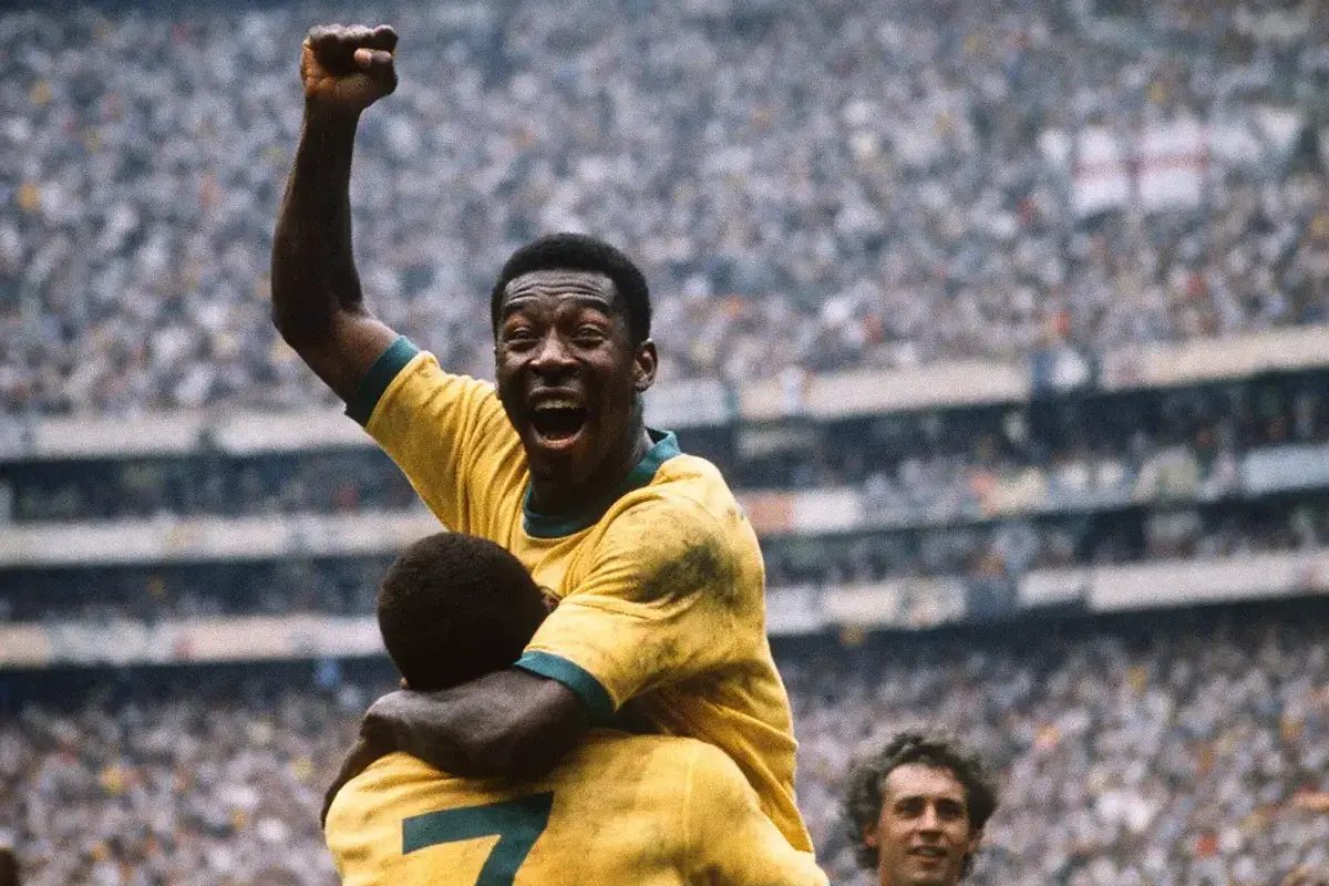 Pelé celebrating during a World Cup match