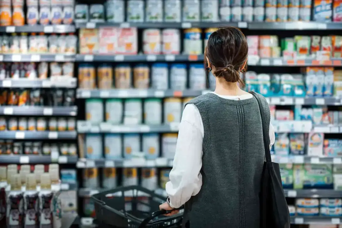 American shopper selecting preferred products