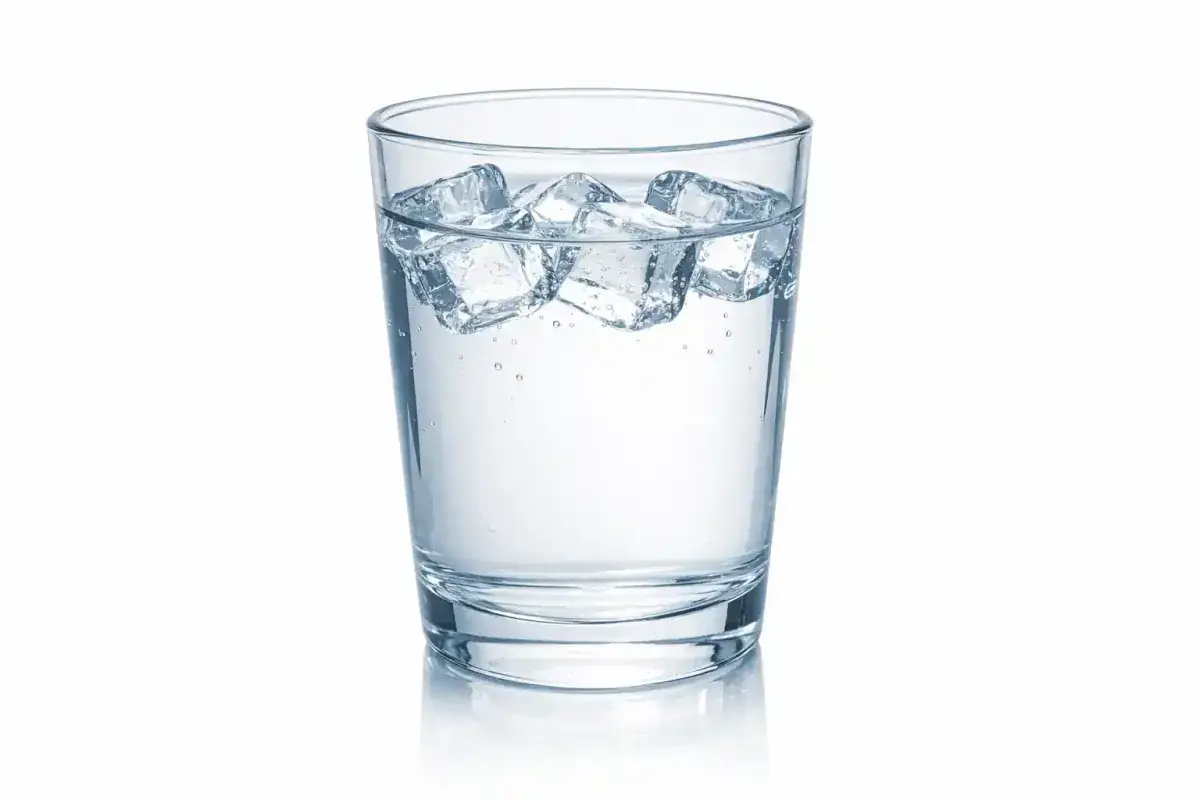 Ice cubes floating on water surface