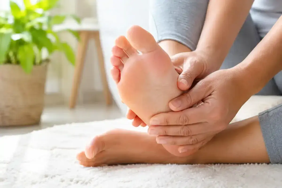 Checking feet for healthy skin and nails