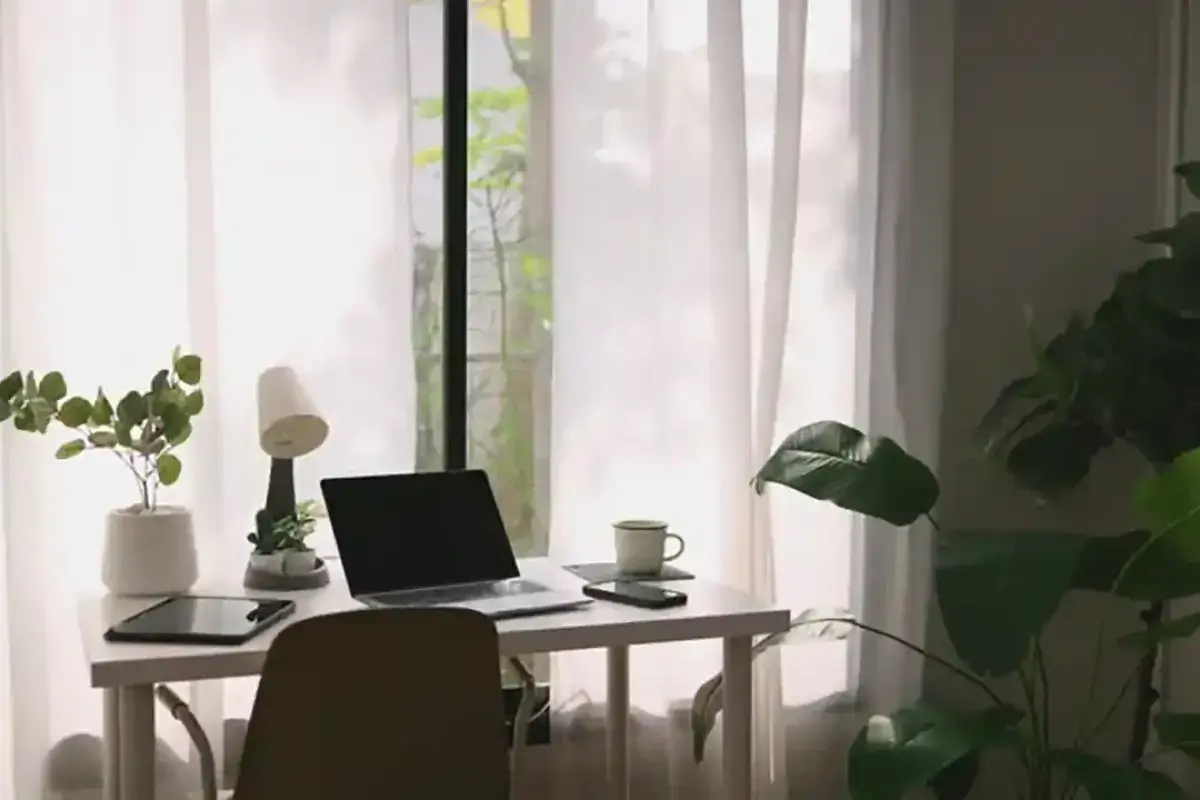 Modern home office setup representing the return of remote work in 2025