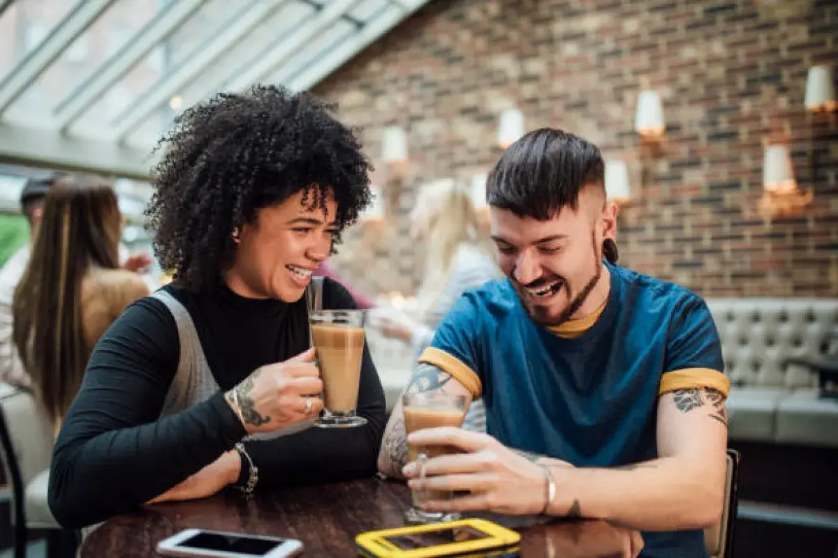 People connecting authentically, enjoying a moment unfiltered by digital distraction