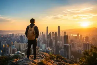 A lone traveler looking toward a distant city skyline at sunrise