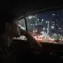 A person reflecting during a life changing taxi ride