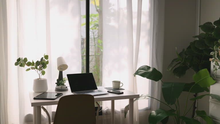 Modern home office setup representing the return of remote work in 2025