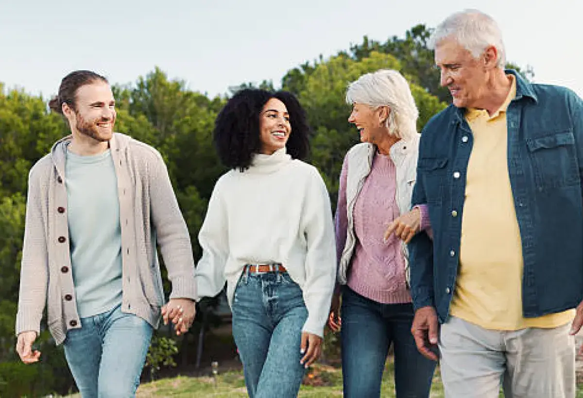 Generations walking together symbolizing unity, joy, and shared purpose.