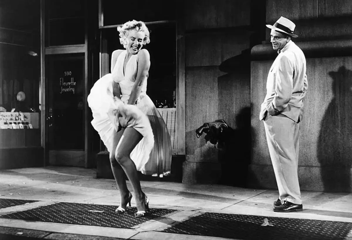 Marilyn Monroe wearing iconic high heels on movie set