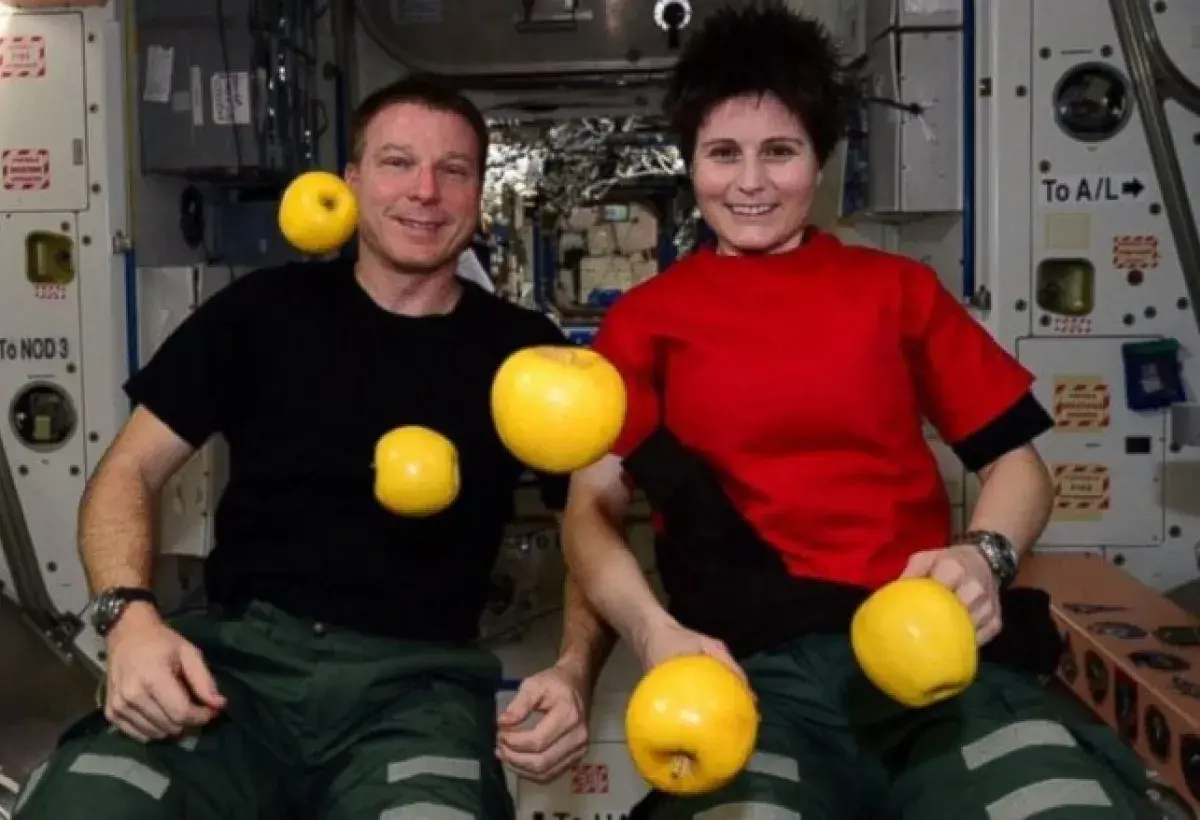 NASA Astronaut Eating Apple in Space