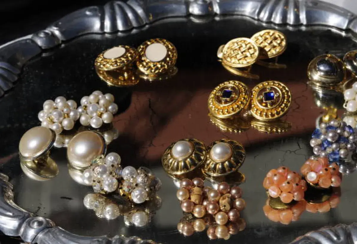 Vintage clip on earrings in decorative jewelry box