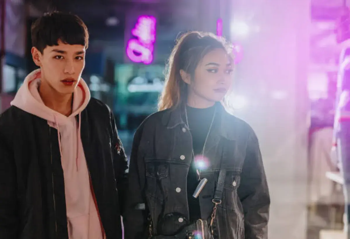  Two K-pop idols walking together representing freedom and privacy