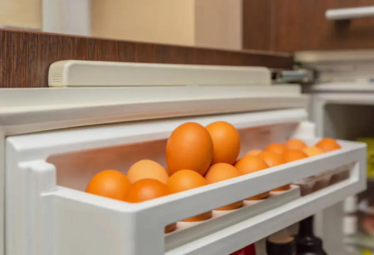 Proper egg storage inside a refrigerator to maintain freshness.