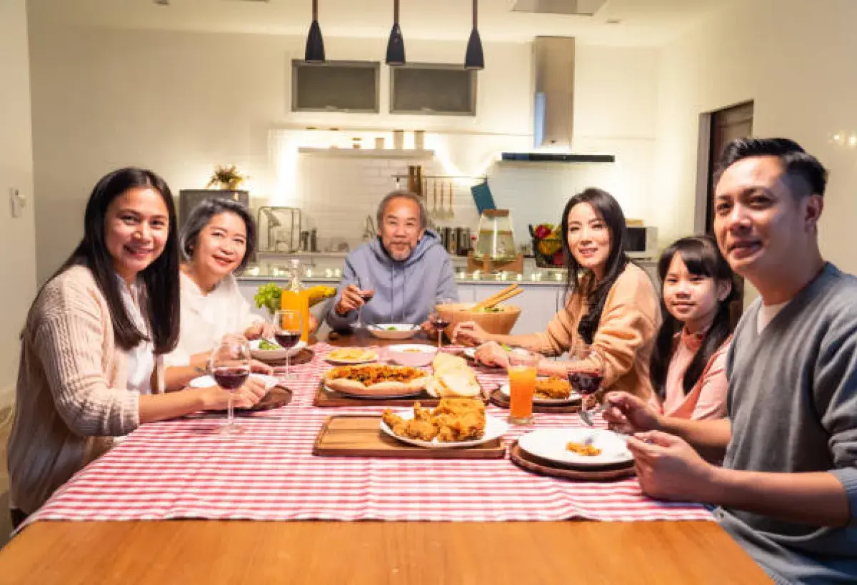 Filipino family thriving in a multigenerational home after implementing privacy and respect solutions.