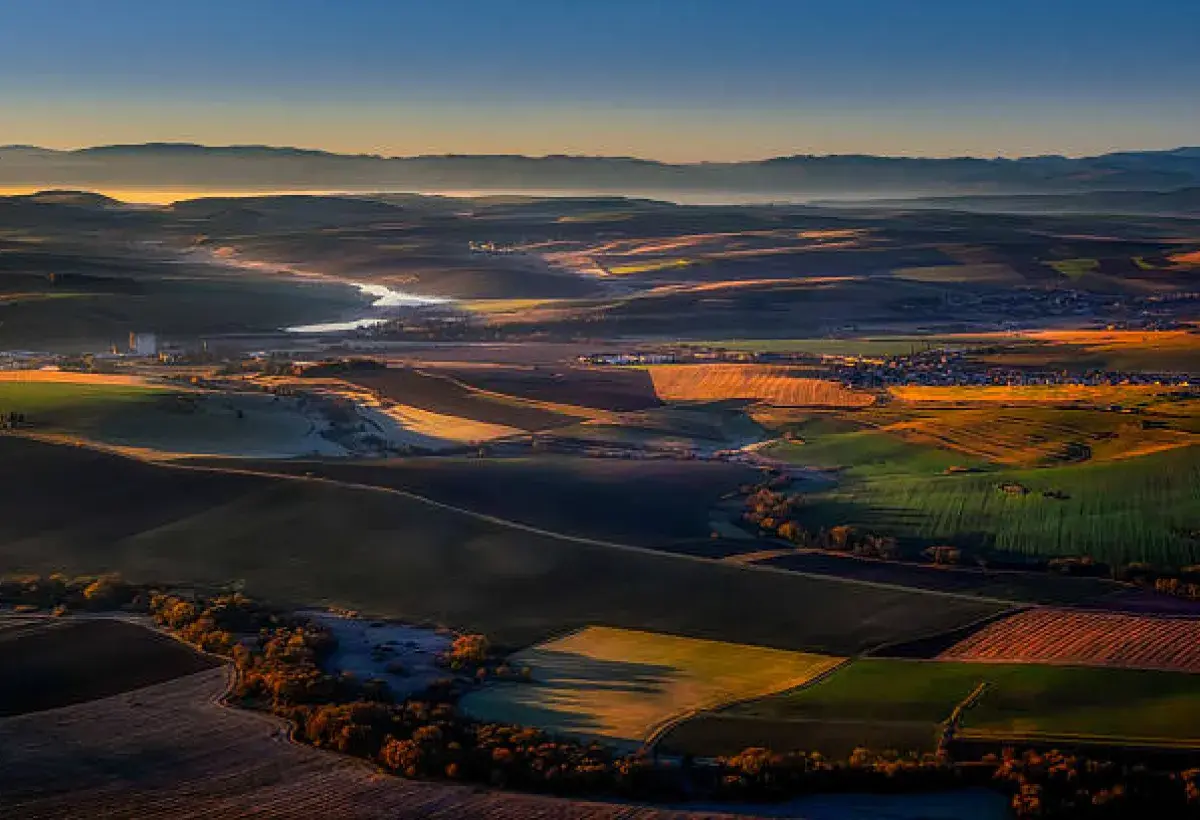 The first light of dawn symbolizing hope after darkness