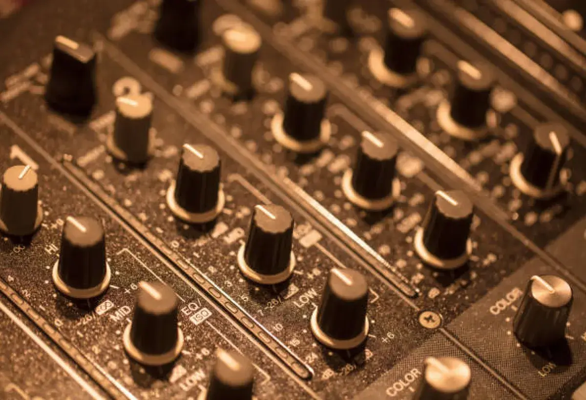 Vintage recording console representing production of the album