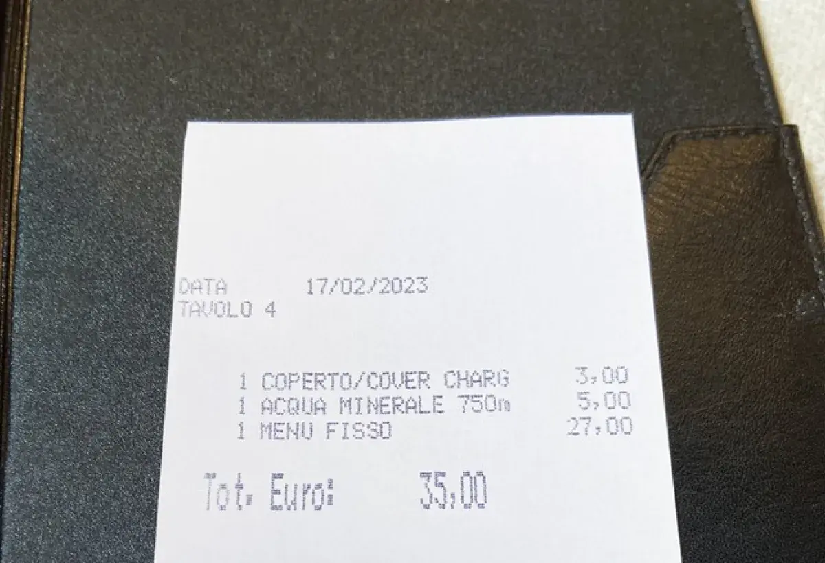 European restaurant bill with included service charge