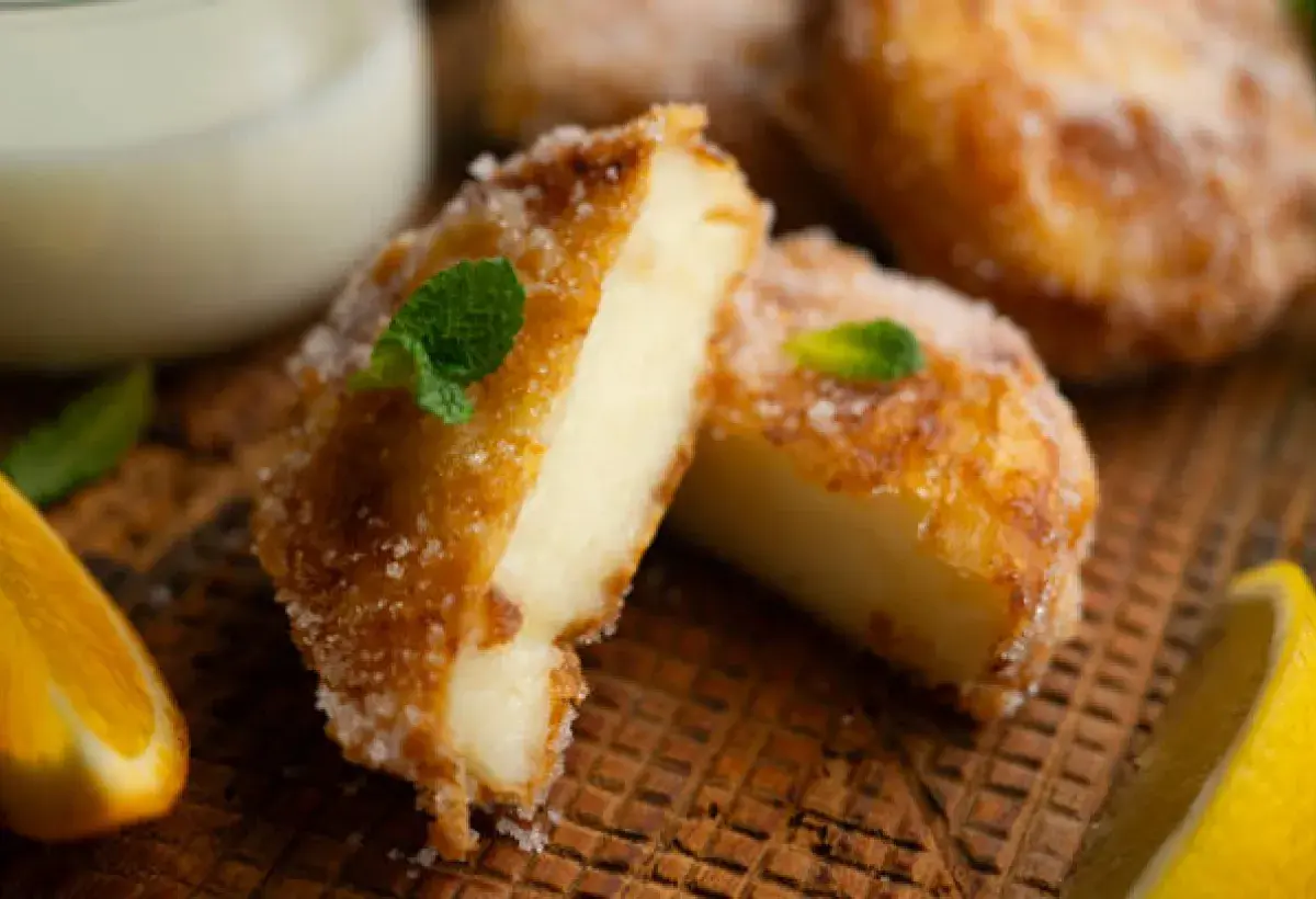 Spanish fried milk dessert with golden crust and sugar topping
