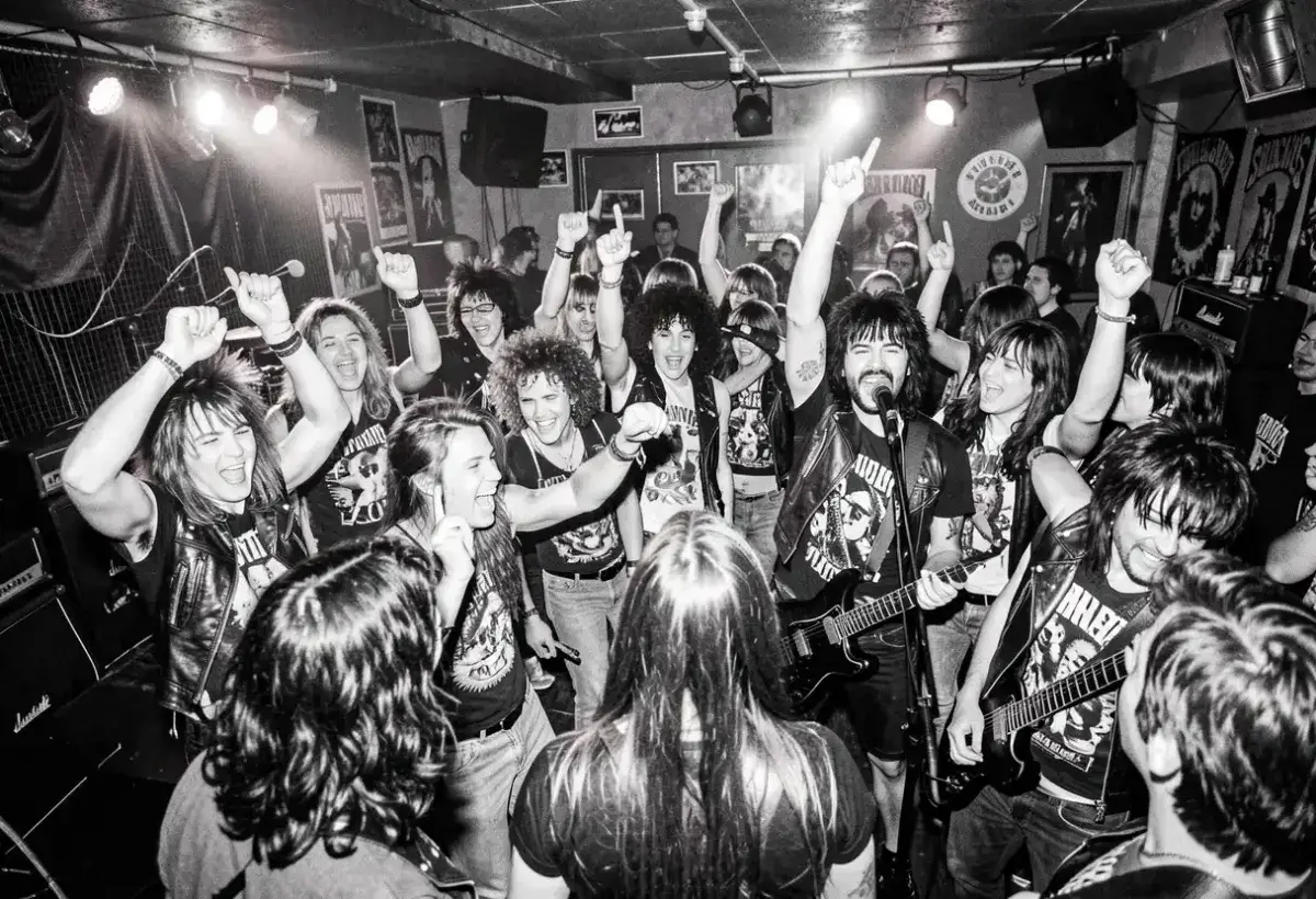 1970s punk crowd at a small club
