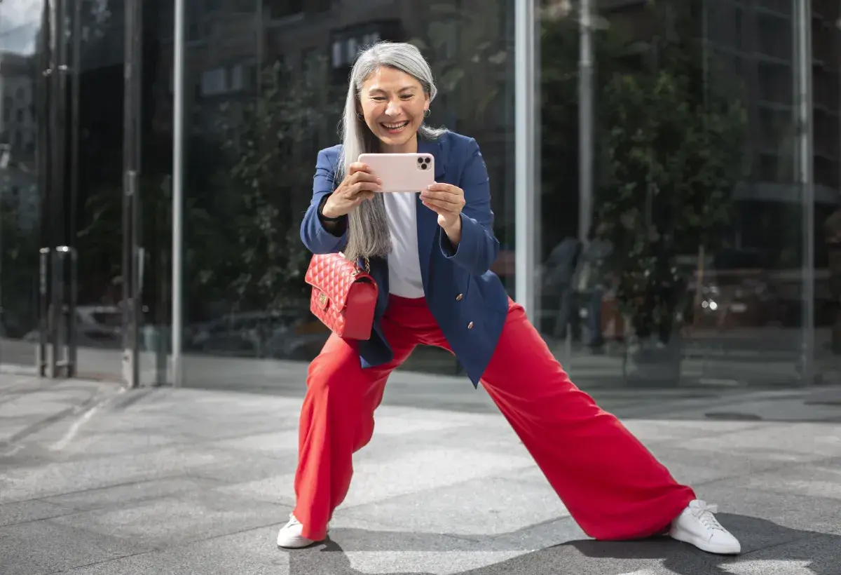 happy woman taking a selfie 