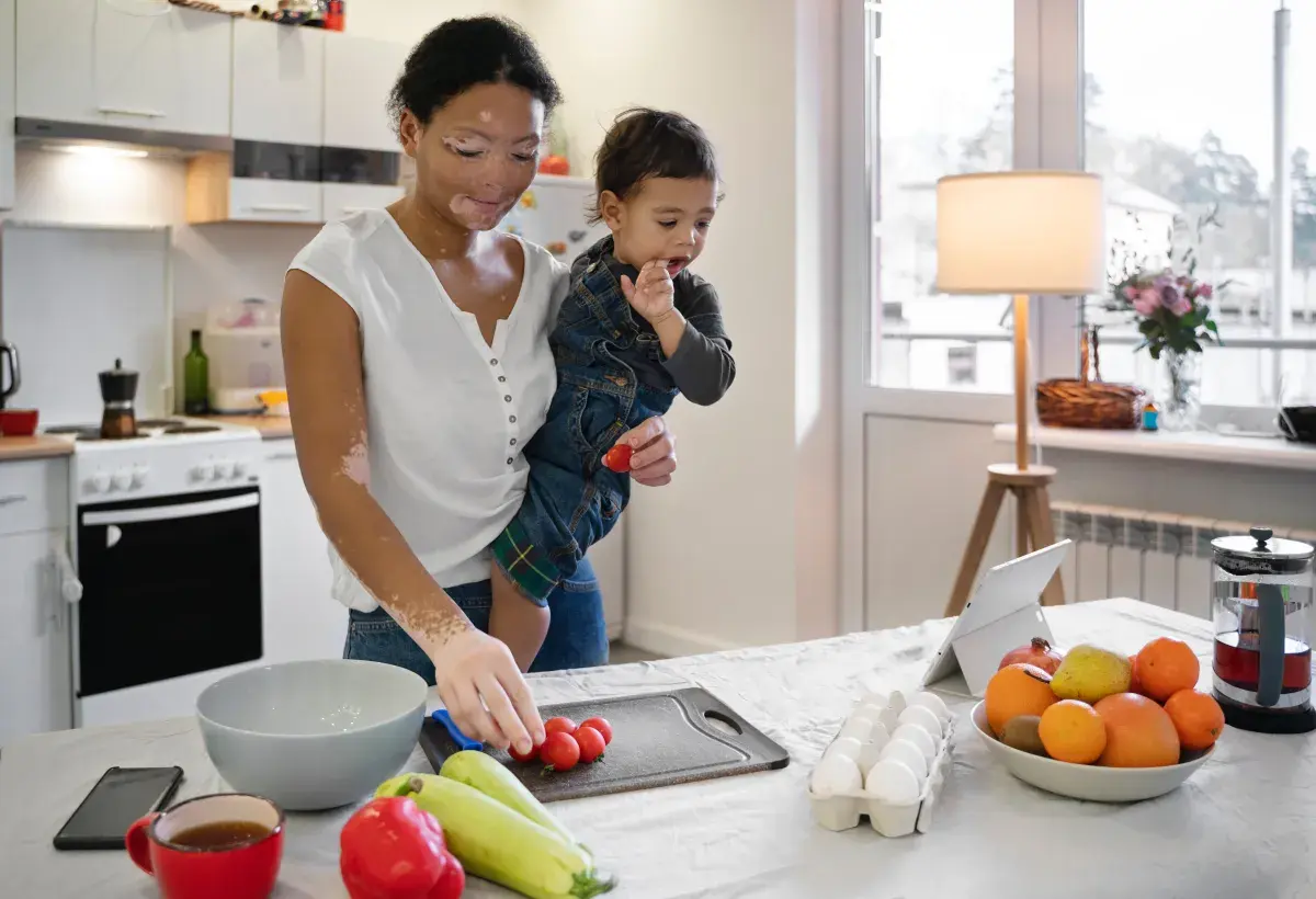 mother in the kitchen with a child