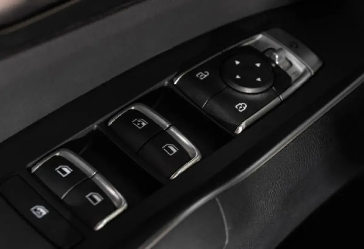 woman locking the car door from inside