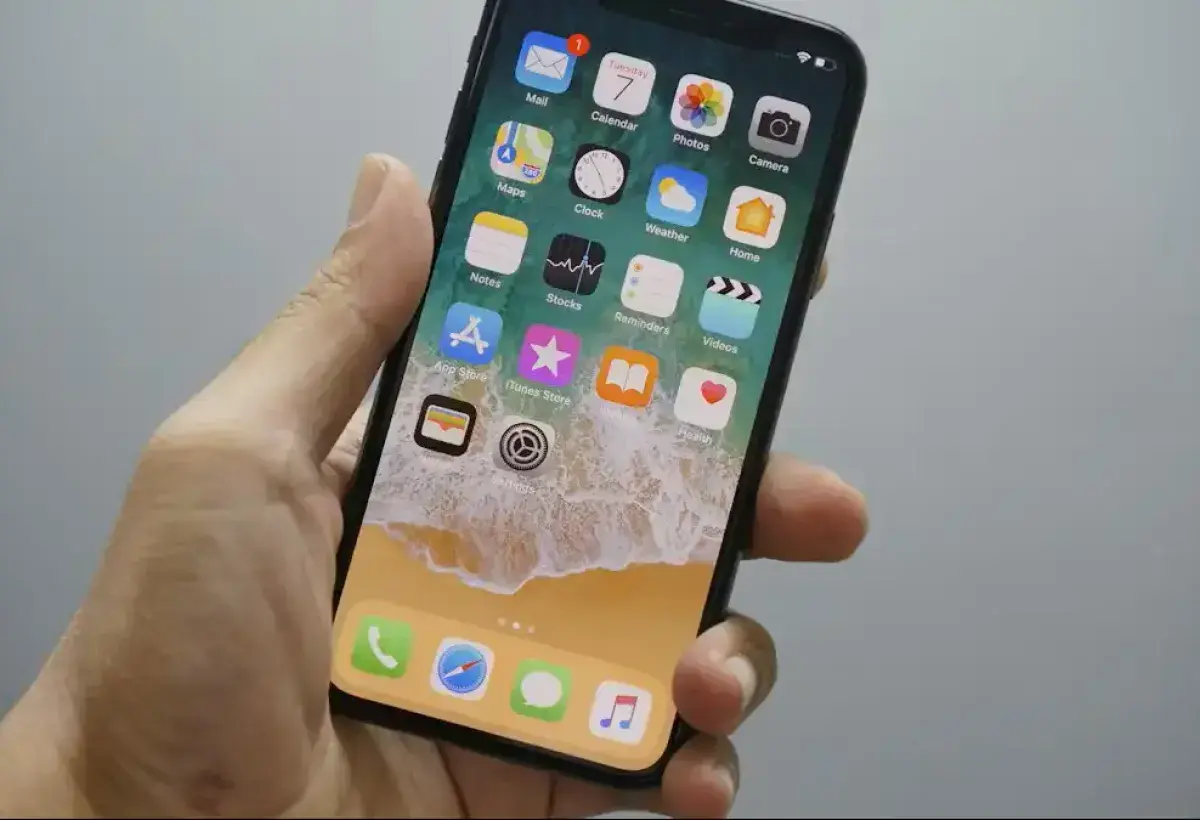 iPhone displaying the standard iOS home screen layout
