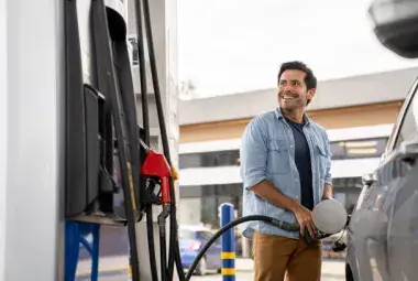 Car being refueled at a gas station