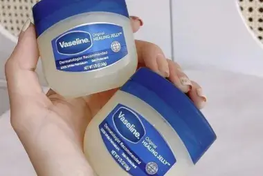 modern Vaseline jar highlighting over a century of skincare history