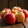 Fresh Apples on Wooden Table