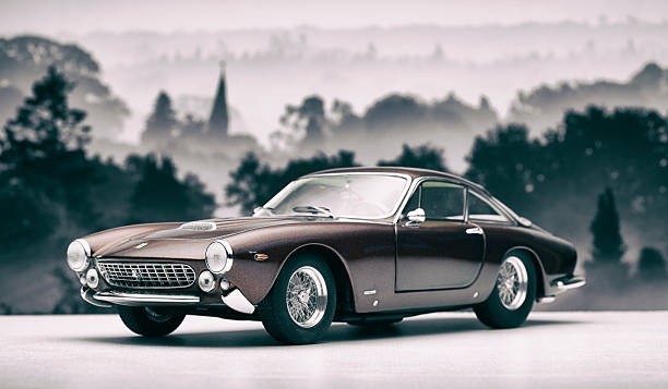 What Italian design house created iconic cars like the Ferrari 250 GT Lusso and Alfa Romeo Spider?