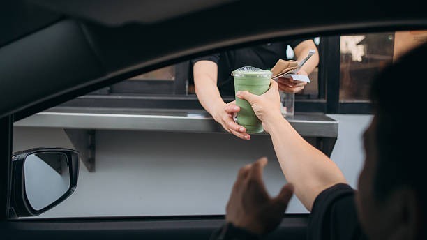 What U.S. city is credited as the birthplace of the first drive-thru restaurant?