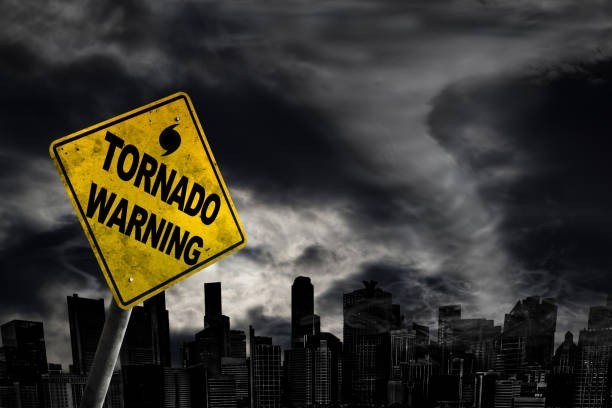 What color are tornado warning signs usually shown on weather maps?